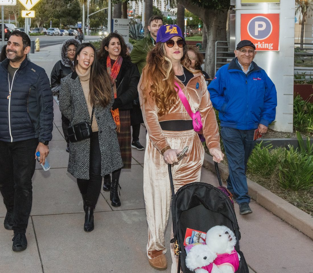 Brianna leading a group of guests down a West Hollywood sidewalk