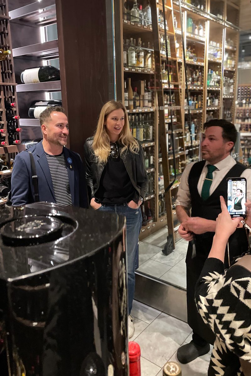 Guests inside a private wine room on the tour